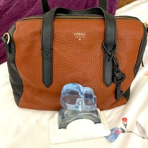 Fossil Sydney includes  crossbody strap.